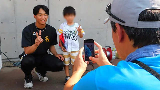 選手と写真撮影
